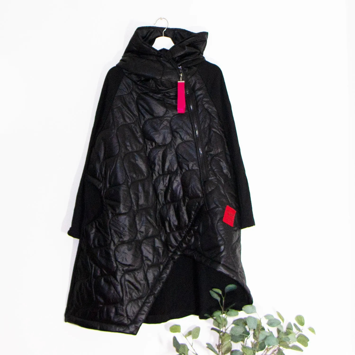 Edgy long puffa parka jacket with hood and drawstring and red zip and patch elements